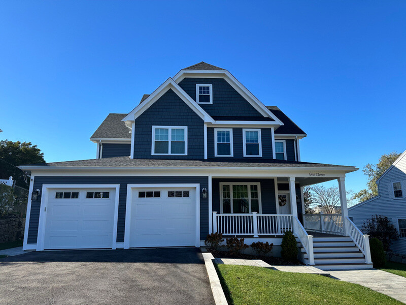 Suburban home in daylight before permanent lighting